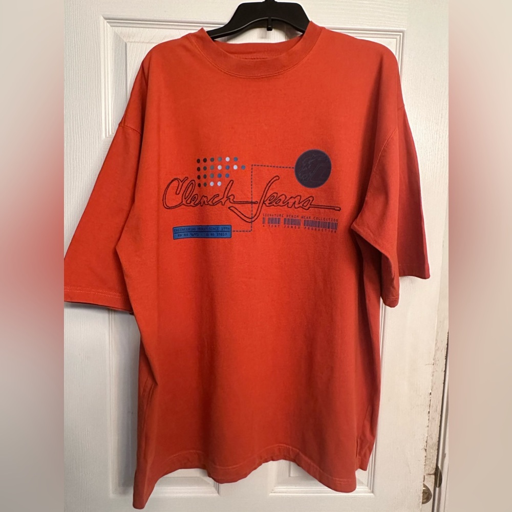 Clench Jeans Burnt Orange Men’s Tee used excellent condition